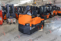 Самоходный Тягач для склада/производства T60Q 6000kg Sit-on tow tractor, standard with AB 48/400+ 48/55, with blue light and rearview mirror, and walkie mode button, optional Controller Curtis F4A and display, Seat armrest , Color: Orange & grey HV Market