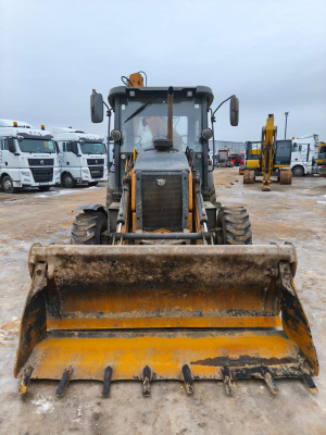 Case 570 Экскаватор-погрузчик