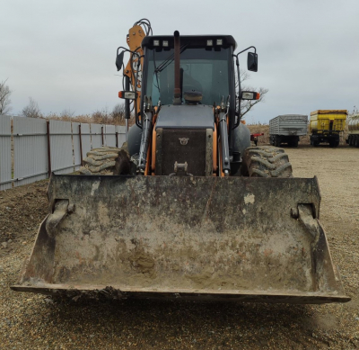 Case 695* Экскаватор-погрузчик